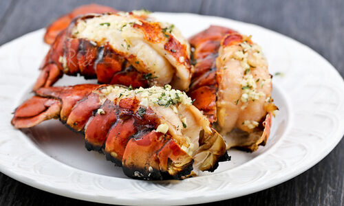 Split Grilled Lobsters with Herb Butter