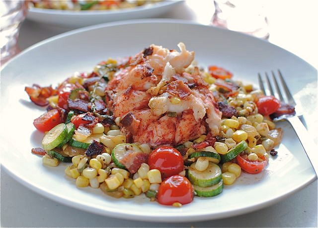 Seared Lobster Tails with Garden Vegetables plate fork